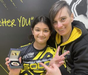 oung student earning Level 1 Leadership Medal at SOLO Martial Arts Academy in Newcastle upon Tyne